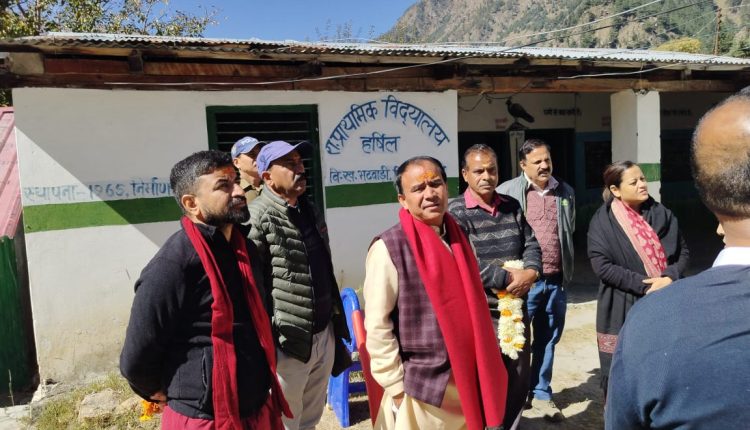 Dr. Dhan Singh Rawat